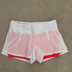 Athletic shorts with spandex underneath.